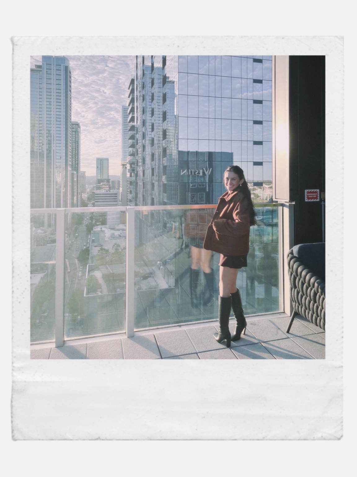 Natasha on a city balcony