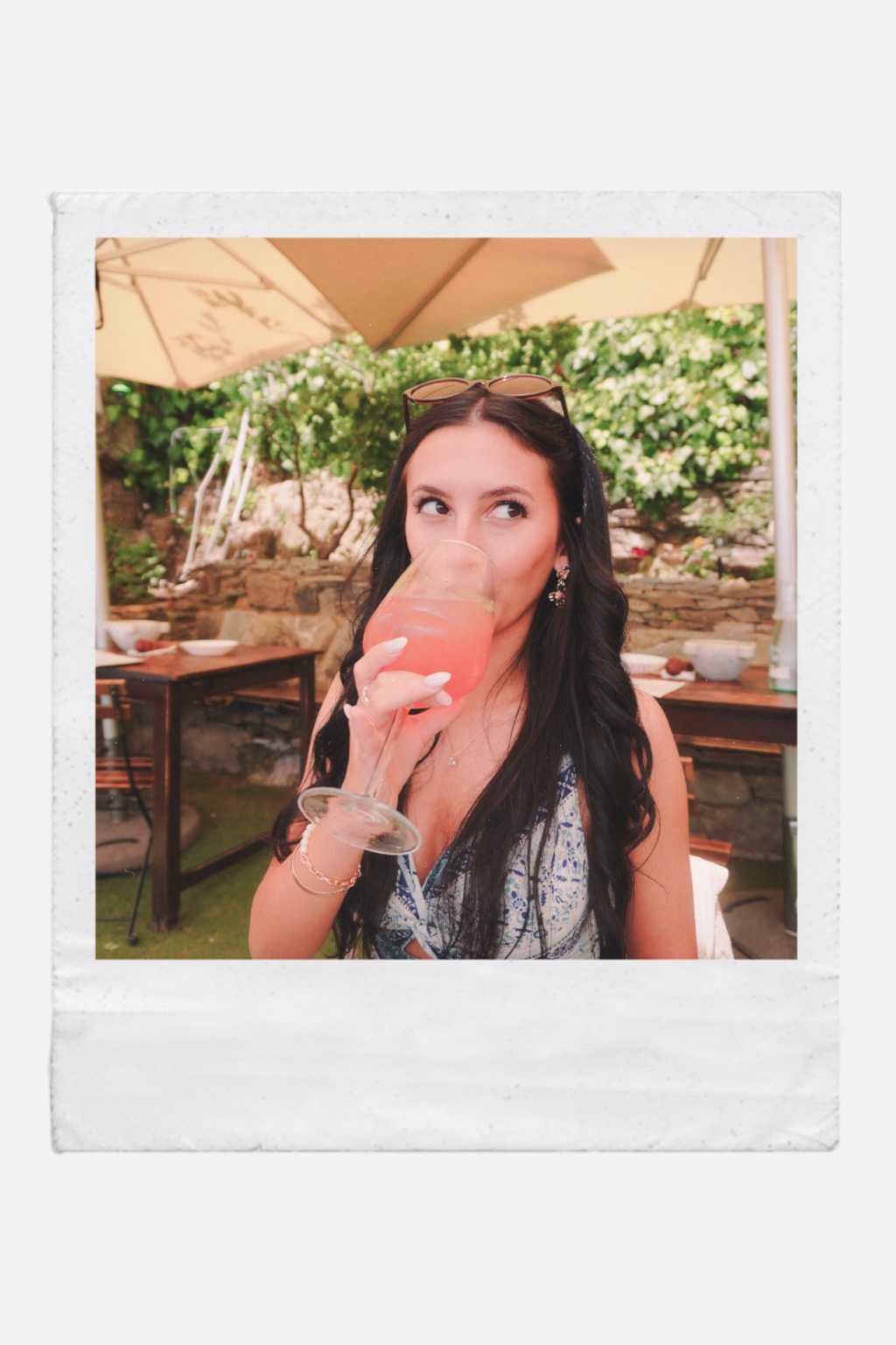 Natasha enjoying a pink drink